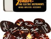 Fender kostki gitarowe celuloidowe - zestaw 12 sztuk, puszka kolekcjonerska – zdjęcie 2
