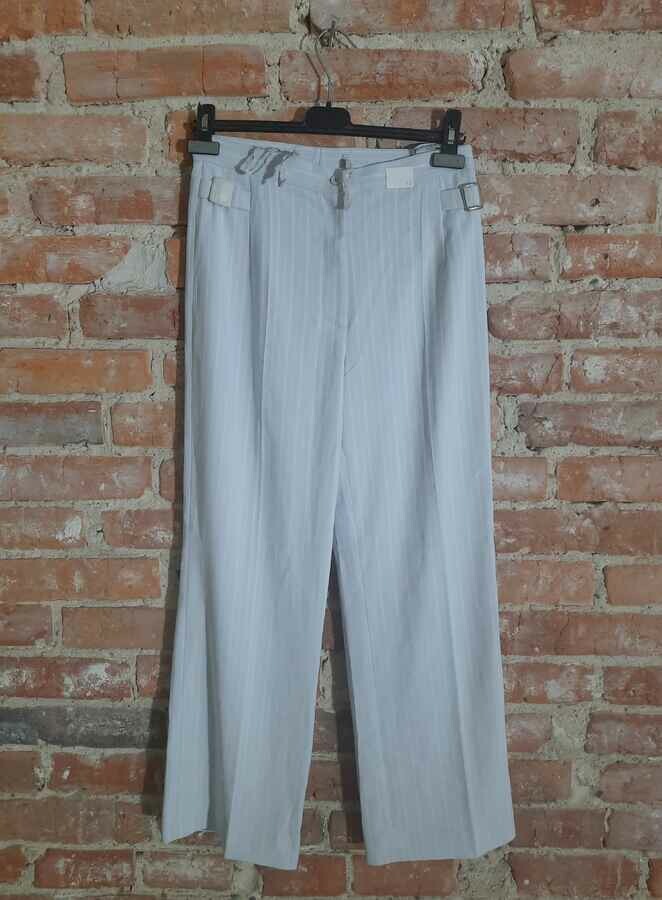 Eleganckie spodnie damskie w delikatne paski – stan: nowy