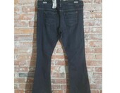 Spodnie damskie jeansowe slim fit typu flare leg (stan nowy) – zdjęcie 2