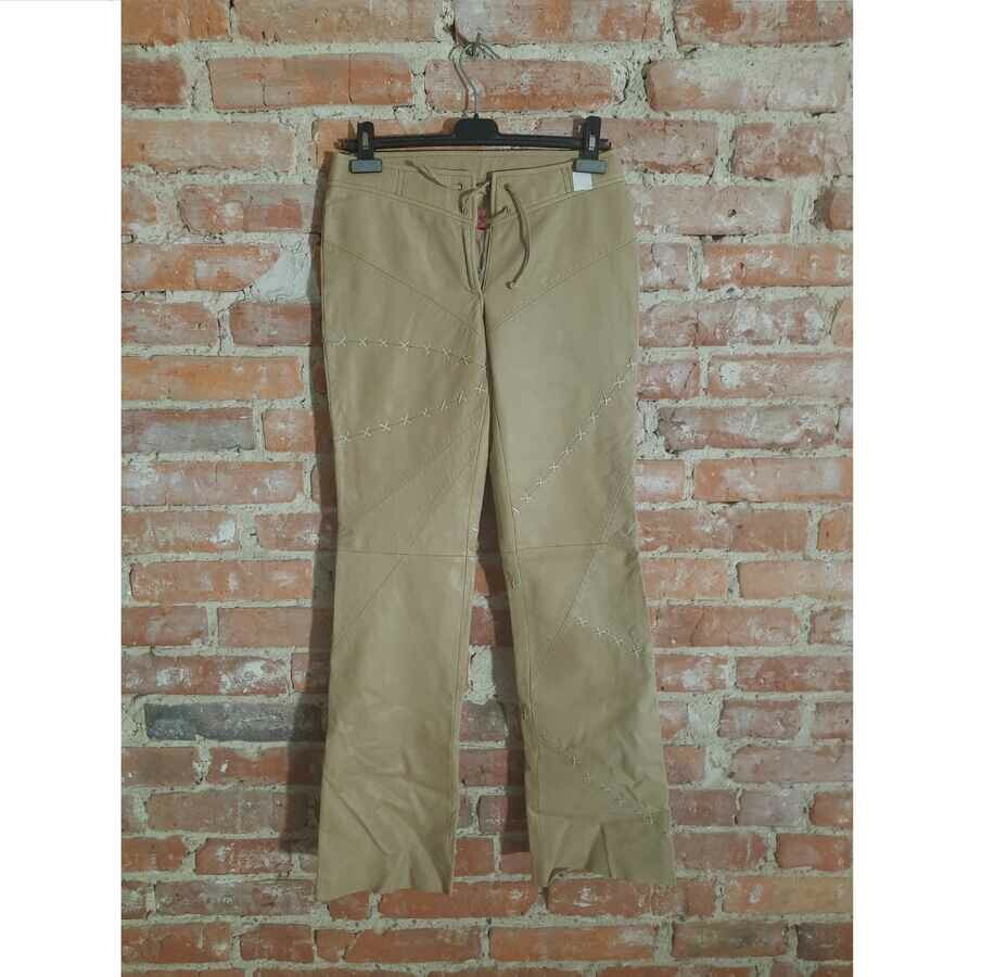 Skórzane spodnie damskie z ozdobnym szyciem (stan nowy)
